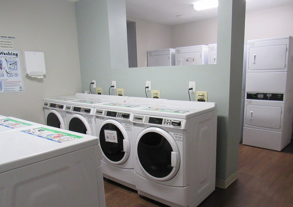 a washer and dryer room in a laundry room